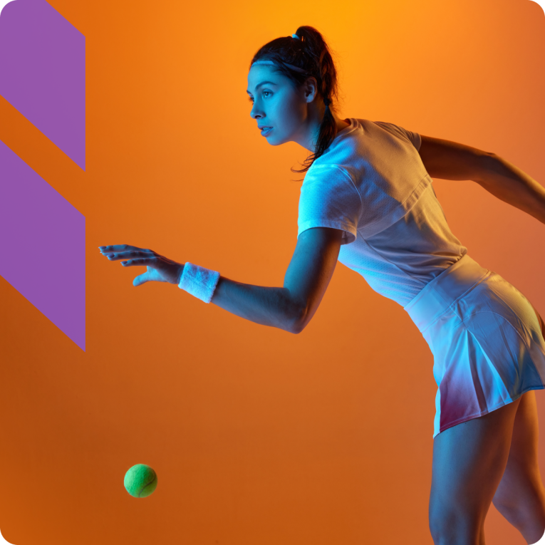 Girl bouncing tennis ball